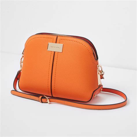 orange cross body purse